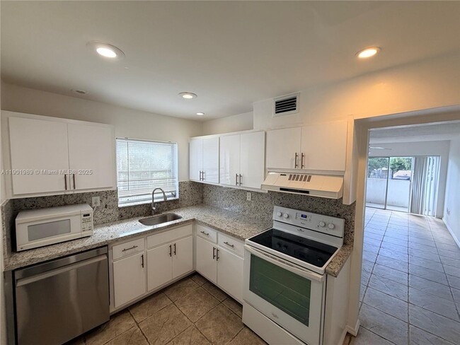 Building Photo - 7715 SW 86th St Unit A2-208