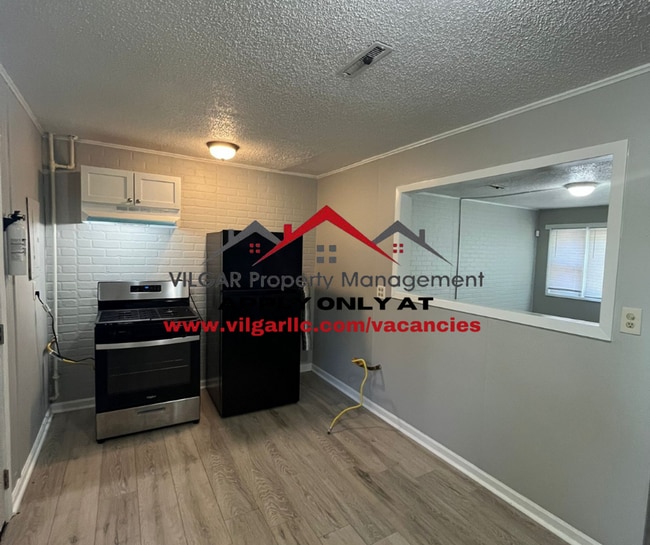 Building Photo - Step into comfort and security in this bea... Rental