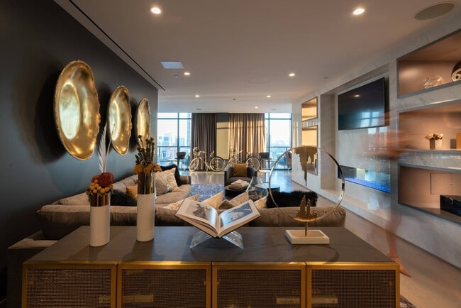 Resident lounge on 28th floor with spectacular city viewsExquisite details throughout the rooftop lounge.Outdoor kitchen & fireside lounge with sunset views.Poolside cabanas for your enjoyment.Resident lounge on 28th floor with spectacular city views28th Floor club lounge perfect for entertaining or