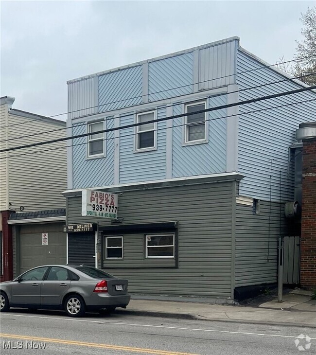 Building Photo - 4203 Clark Ave Unit UPSTAIRS,FRONT Rental