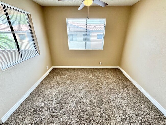 Photo - THIS SECOND-FLOOR DESERT SHORES CONDO OFFE...