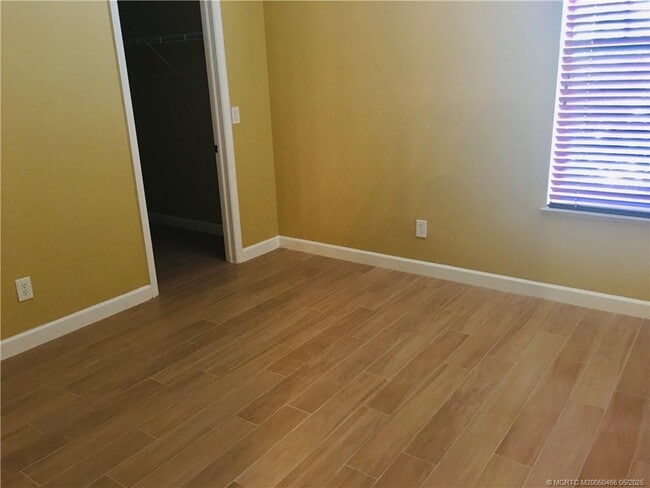 Building Photo - 3582 SW Sawgrass Villas Dr Rental