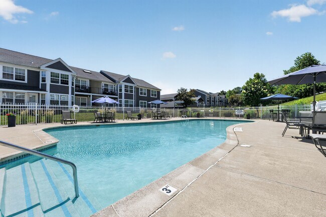 Enjoy a vibrant lifestyle at Summit at Mill Ridge, featuring a refreshing pool surrounded by beautiful landscaping and modern amenities. It’s the perfect place to unwind and socialize. Schedule your visit today to see it for yourself!