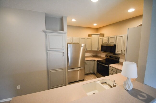 Photo - Spacious 2 Bed, 2 Bath Townhome with Attached Garage Available Now!