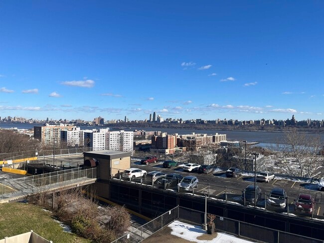 Building Photo - 9060 Palisade Ave Unit 307