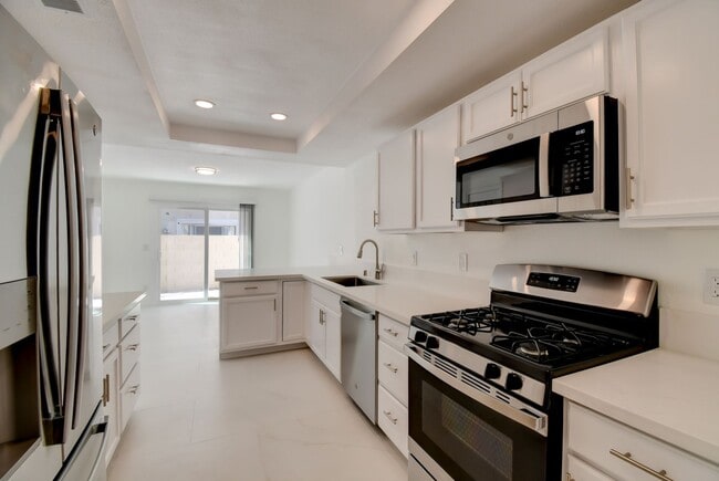 Building Photo - Beautifully renovated two-story home tucked inside a quiet, tree-lined community in the heart of ... Unit 105 GOOSEBERRY LANE