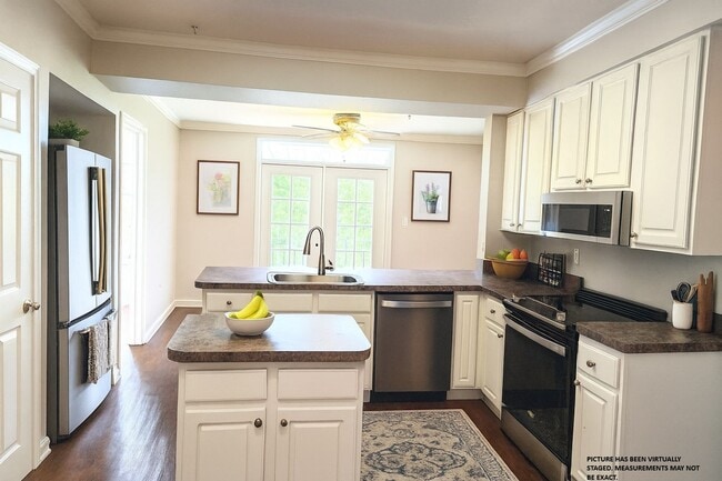 Building Photo - 2x2 Updated! New flooring, Stainless Steel...