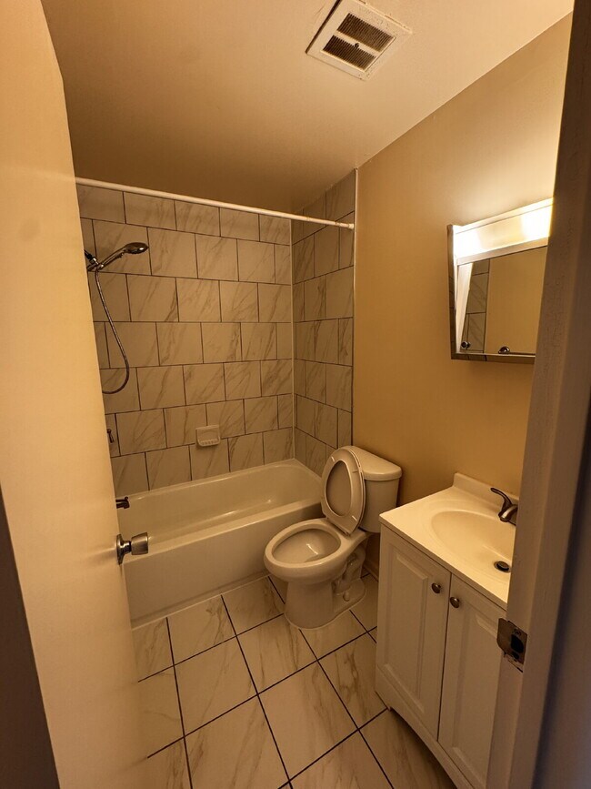 Photo - Sunlit 2BR/2BA Terrace Townhouses Gem with Pool, Assigned Parking & Pet-Friendly Vibes!