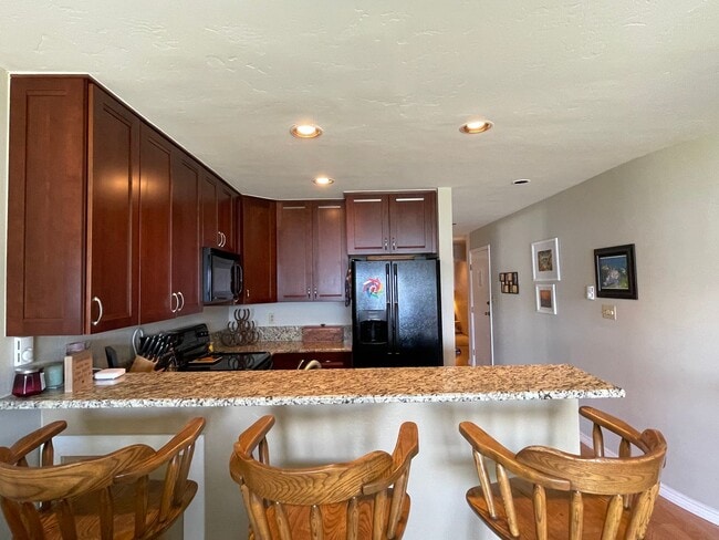 Building Photo - Lakefront Two Bedroom Two Bath Condo in Di... Unit 1