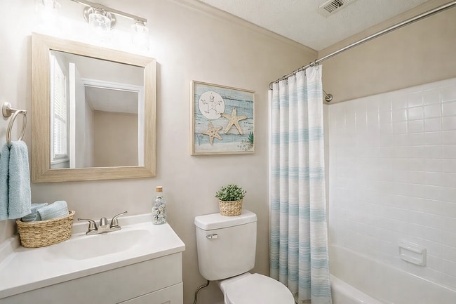 Renovated Bathroom with Natural Light - Pebble Creek Apartments