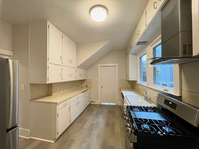 Photo - Elegant 4BR 2.5Bath Home with Fenced Yard & Garage Across from Seattle Prep**2 weeks free**