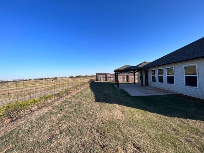 Photo - Available now 4 Bed 2 Bath in Mustang!