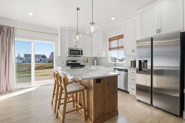 Photo - Like-New Rambler in The Village at Fox Meadows | Mountain Views, Pool Community & All Appliances ...