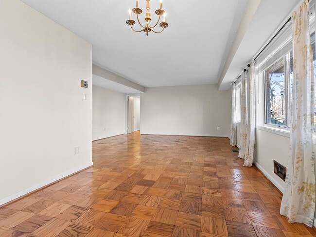 Photo - Commuter’s Dream! Large 2BR/2BA Condo Steps from Metro – All Utilities Included!