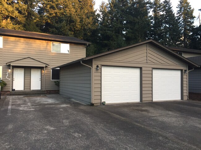 Entry, full size single garage. - 12123 125th Avenue Ct E Townhome
