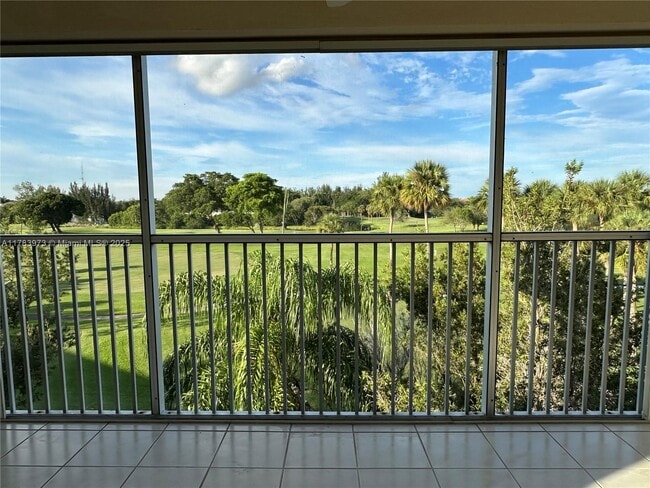 Building Photo - 12701 SW 13th St Unit 401F Rental