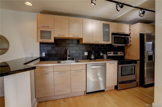 Photo - LOCATION LOCATION!! Open and spacious corner unit that offers abundant natural light and is conve... Unit 305