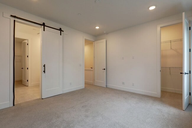 Photo - Live Where Style Meets Convenience – 2BR Townhome + Garage