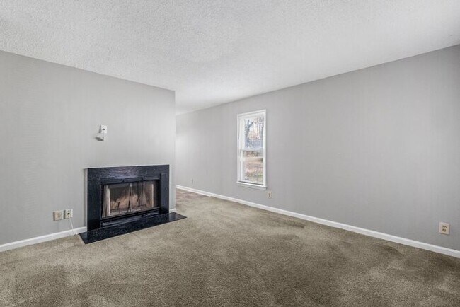 Photo - NE Home - Updated Kitchen and Bathrooms! SS Appliances, Fire Place, Front Porch & Deck, Fenced Yard!