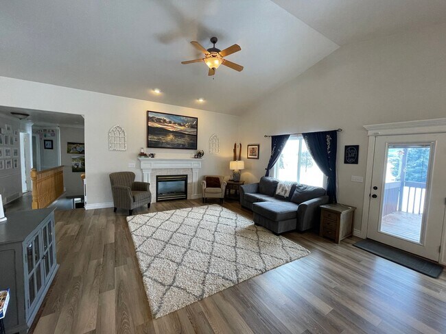 Photo - Beautiful home with 3 car garage and oversized covered deck.