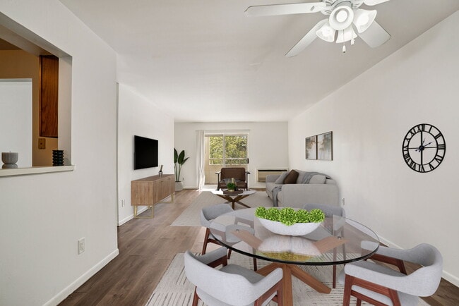 Spacious living areas provide room for stylish furnishings and entertaining (virtually staged), professionally operated by Highlands Vista Group. - Madison Estates