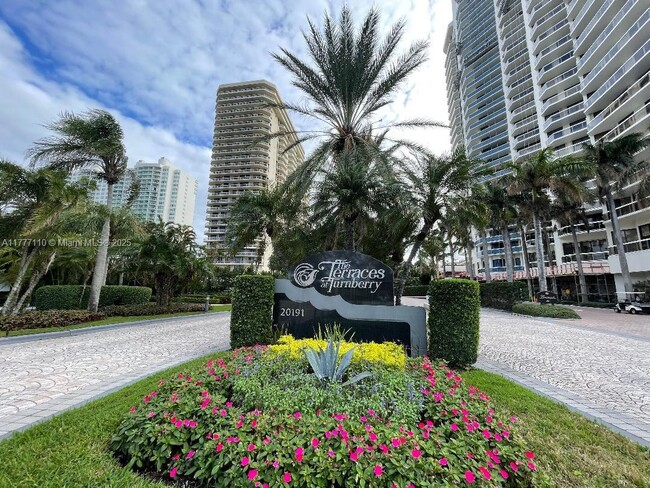 Building Photo - 20191 E Country Club Dr Unit 408 Rental