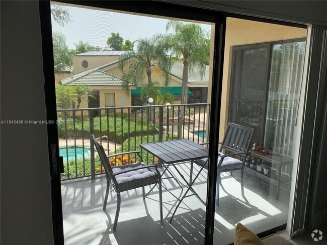 Building Photo - 9999 Summerbreeze Dr Unit 402 Rental