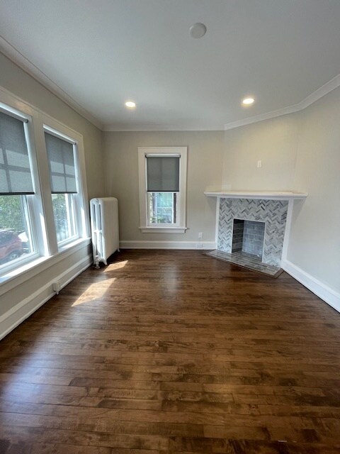 Unit 1 Living room - 1708 E Geneva Pl Apartments