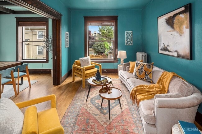 Living Room with Pocket Doors Open - 416 E Roy St Unit H