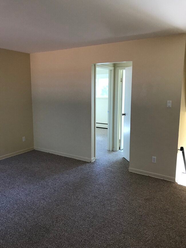 hallway to bath and bedroom