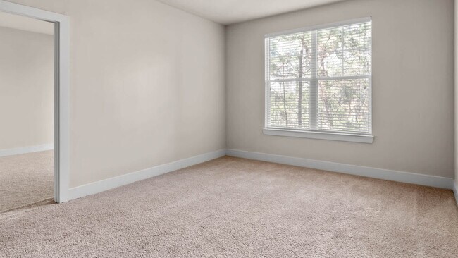 Carpeted Living Room - Reserve at Summit Crossing
