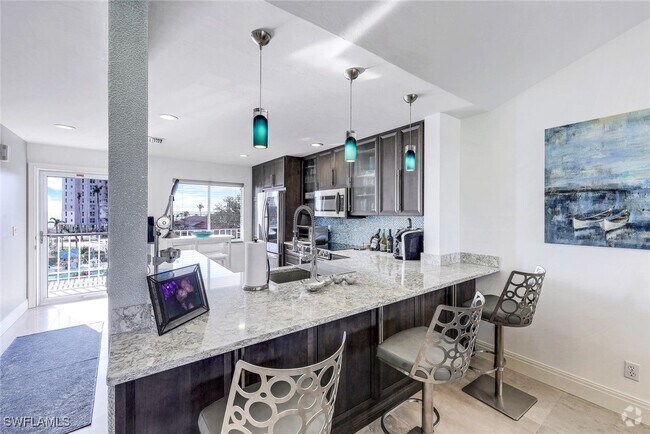 Building Photo - 10684 Gulf Shore Dr Unit B302 Rental