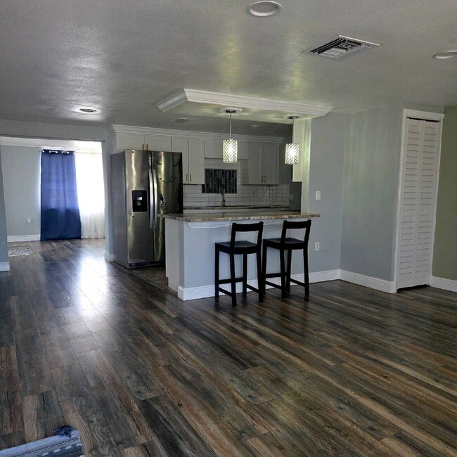 Photo - This gorgeous 2/1 house has been remodeled gourmet chef's kitchen, shaker cabinets, granite count...