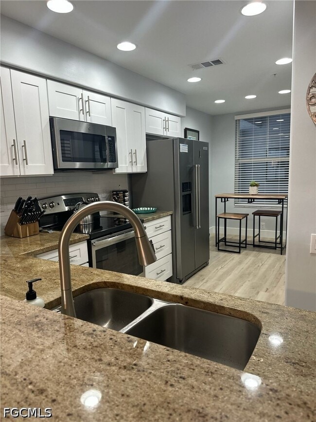 Building Photo - 16421 Millstone Cir Unit 104