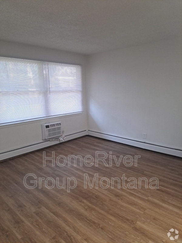 Building Photo - 707 SW Higgins Ave Rental