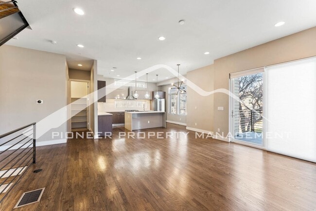 Photo - Fantastic Townhome with A Roof Top Patio, Attached Garage, and Central AC!