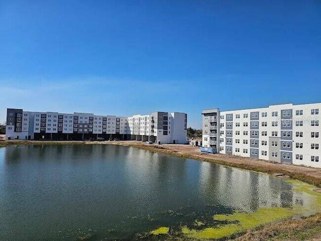 Building Photo - 5587 Millennia Park Dr Unit 207