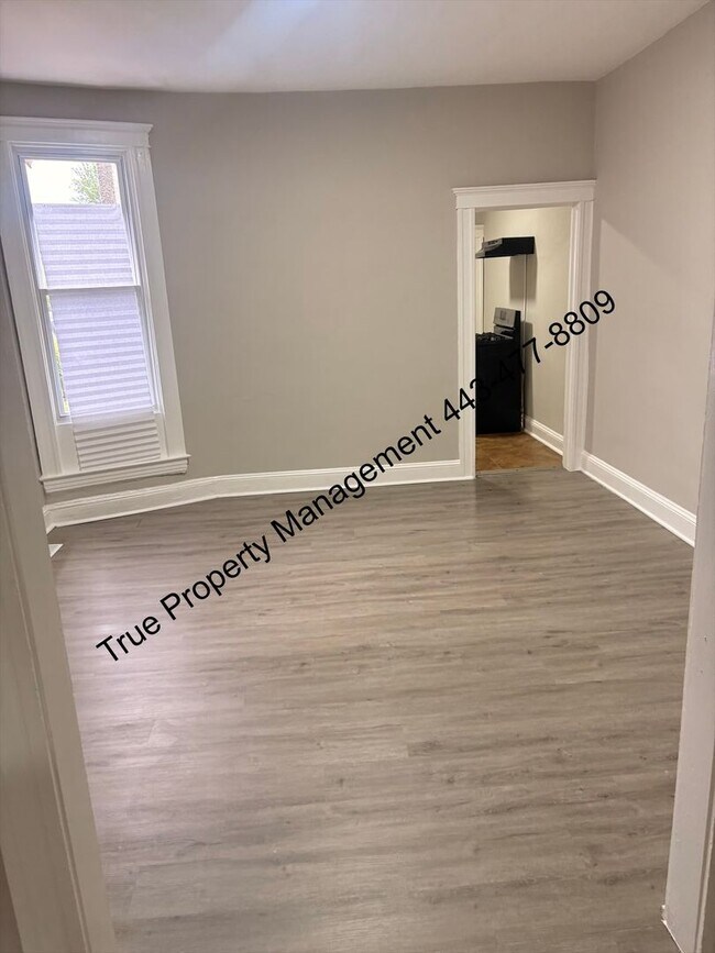 Photo - Spacious 3BR Home with Washer & Dryer, Backyard & Basement – $1,500/Month