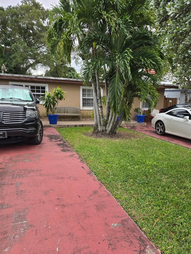 Large driveways. - 6364 SW 33rd St