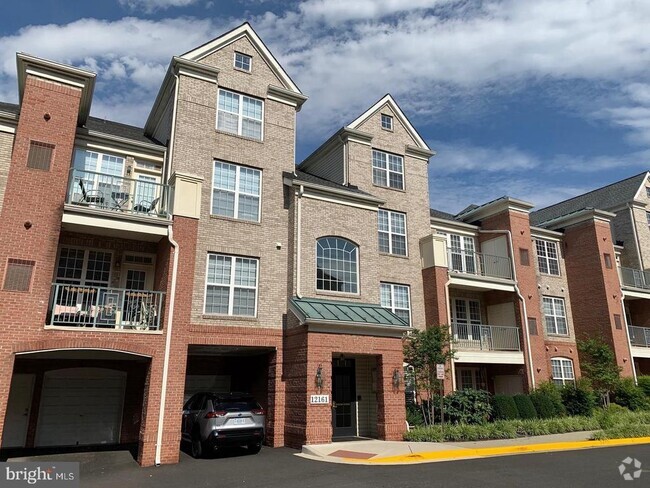 Building Photo - 12161 Abington Hall Pl Unit 304 Rental
