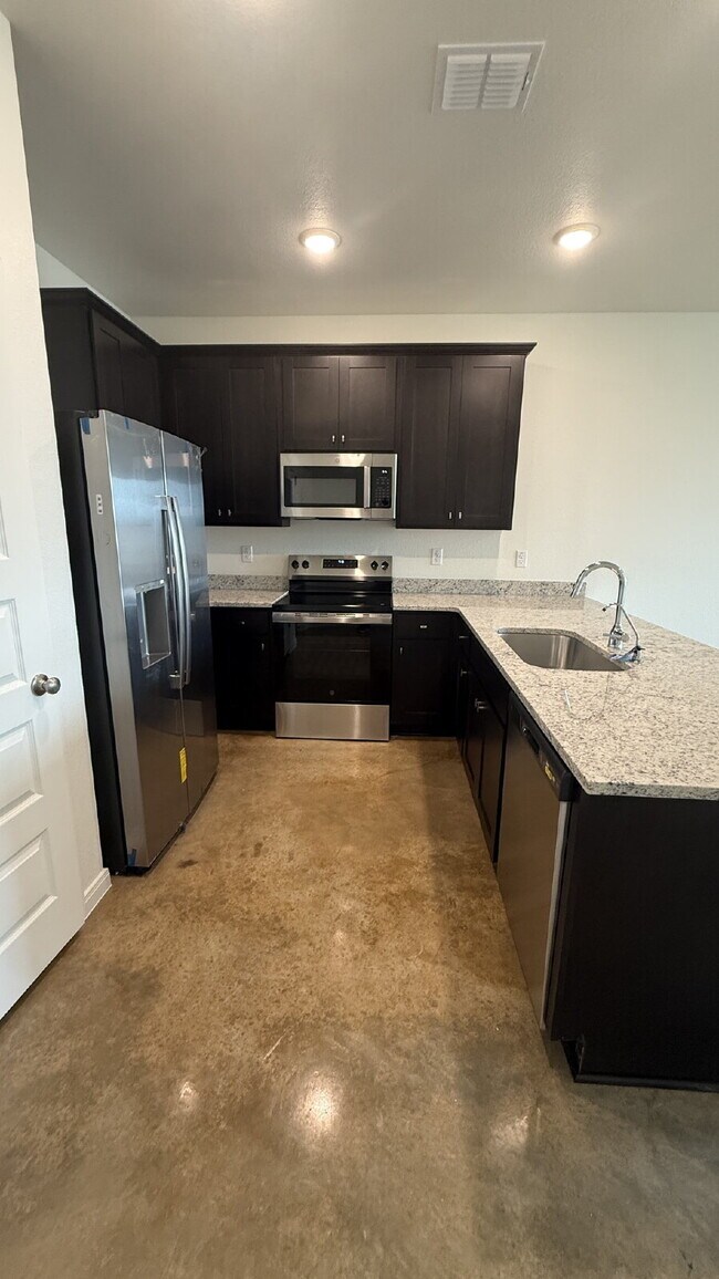 Photo - Brand NEW Spacious & Modern 3-Bedroom Duplex with Washer and Dryer and HUGE Backyard Unit B