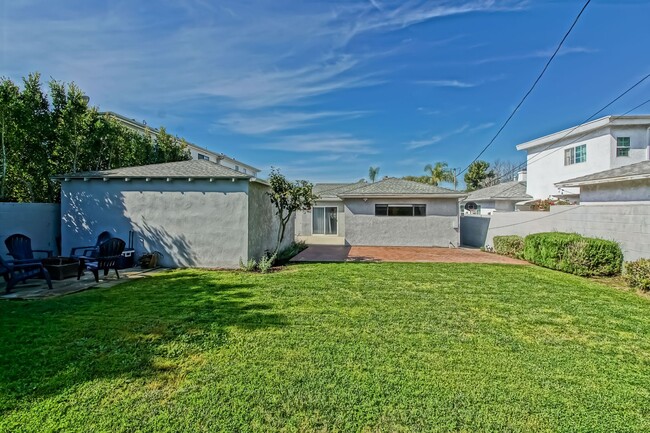 Photo - REMODELED, BRIGHT & AIRY 3BR2BA HOME W/ DETACHED GARAGE, CHARMING FRONT PORCH/YARD & HUGE REAR YA...