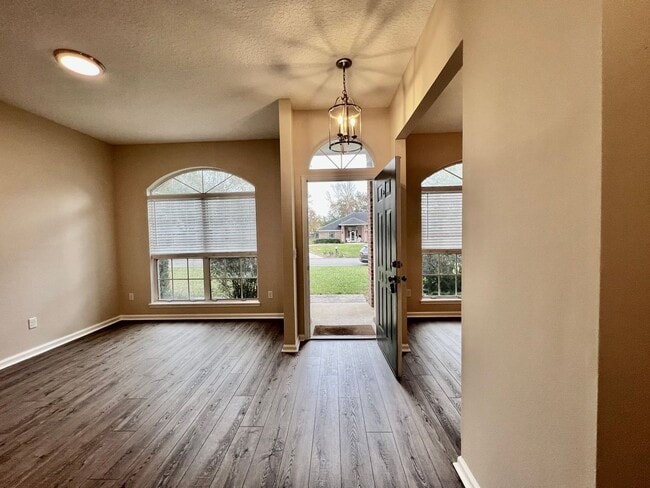 Photo - Behind the Gates: A Corner-Lot 4 bedroom, 2 bath Retreat in Coveted Pace Island!!