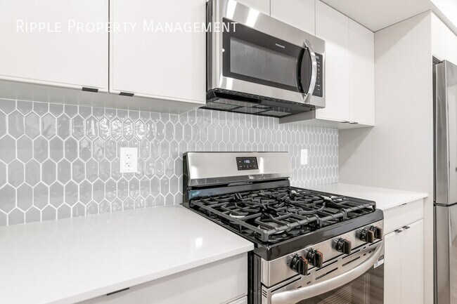 Photo - Modern 3 Beds, 2.5 Baths Main Floor/ Upper | Pets Allowed