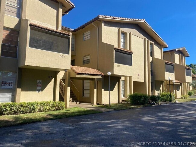 Building Photo - 11101 Royal Palm Blvd Unit 210