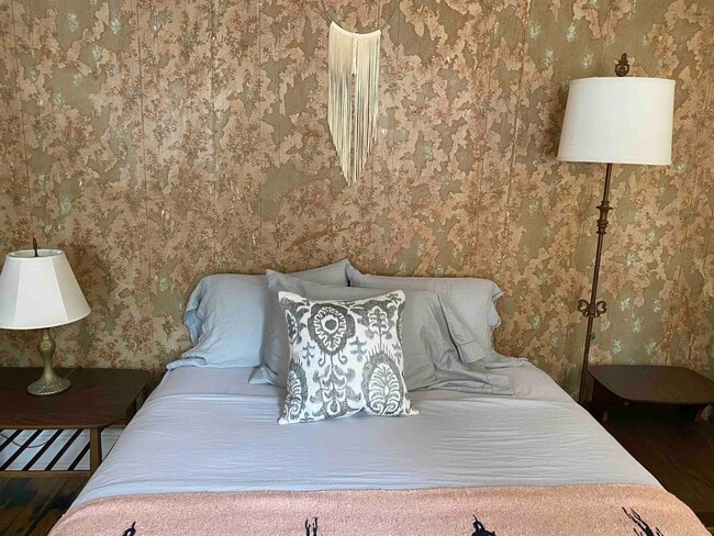 master bedroom w/ antique wall paper - 74 S Main St Unit 2nd Floor