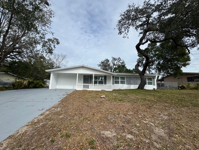 Building Photo - Recently Renovated 4/2 Home with Open Layout & Huge Backyard