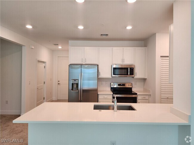 Building Photo - 26401 Coco Cay Cir Unit 103 Rental
