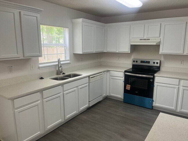 Photo - Available now. Great 4BR/2.5BA Home in Park Hill Place!