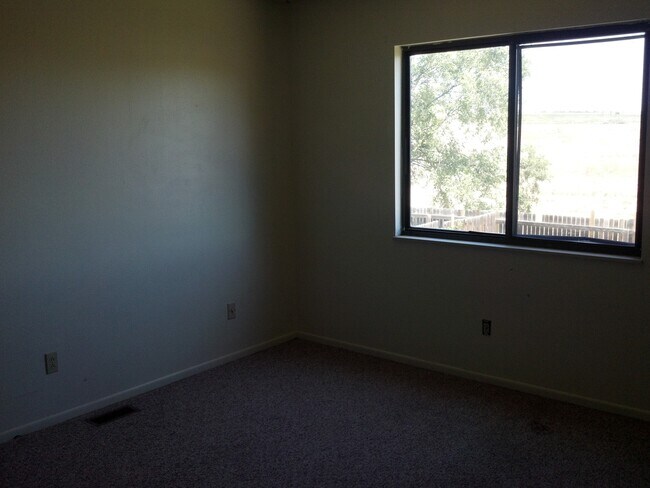 Photo - Widefield side entry bi-level home.